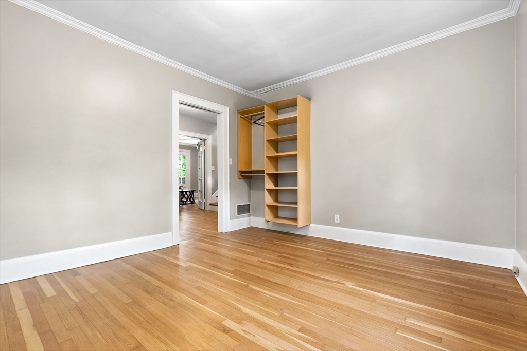 4 Valley Road Danvers, MA 01923 - Photo 19 of 42 a view of an empty room with wooden floor and closet