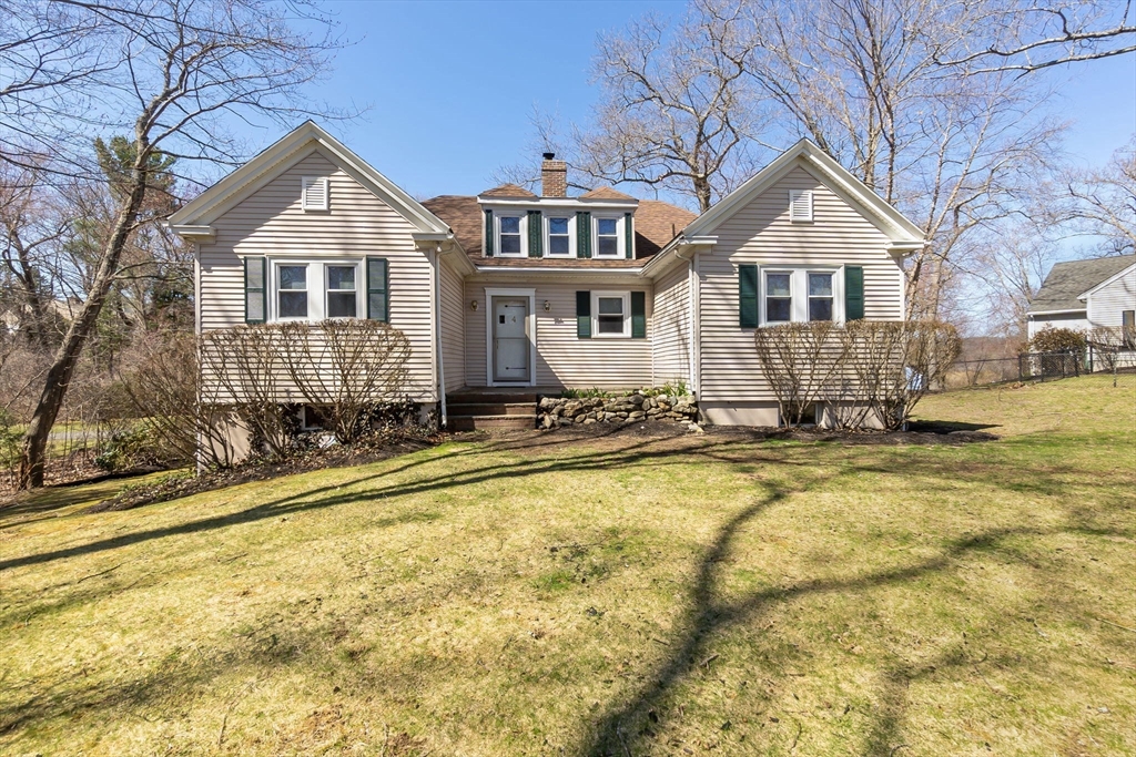 4 Valley Road Danvers, MA 01923 - Photo 2 of 42 a front view of a house with a yard