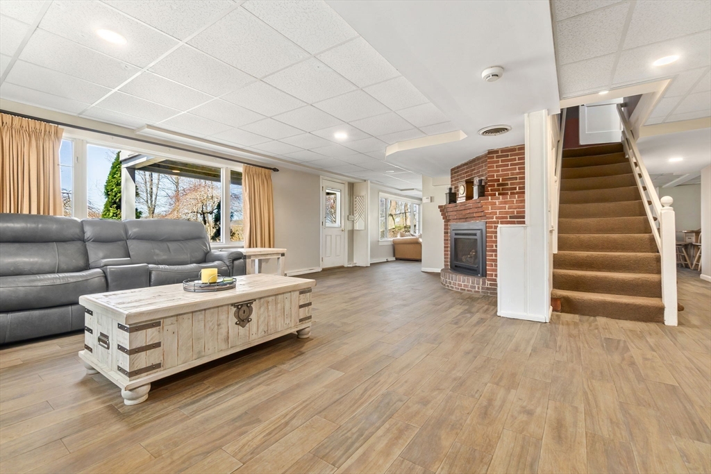 4 Valley Road Danvers, MA 01923 - Photo 25 of 42 a living room with furniture and a wooden floor