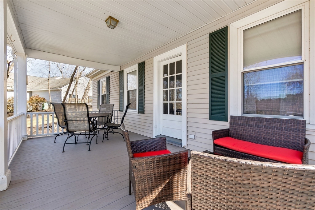 4 Valley Road Danvers, MA 01923 - Photo 30 of 42 a living room filled with furniture and a potted plant