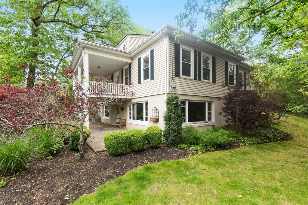 4 Valley Road Danvers, MA 01923 - Photo 33 of 42 a front view of a house with garden