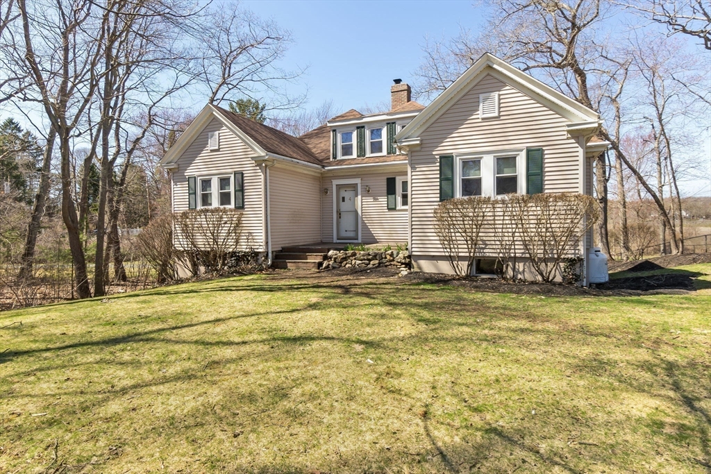 4 Valley Road Danvers, MA 01923 - Photo 36 of 42 a front view of a house with a yard