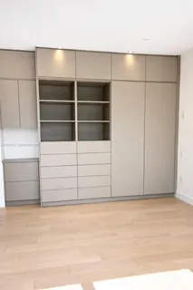 a bathroom with a bathtub and a sink