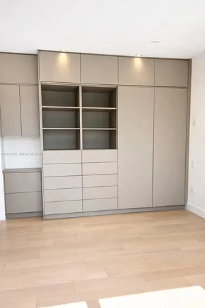 a bathroom with a bathtub and a sink