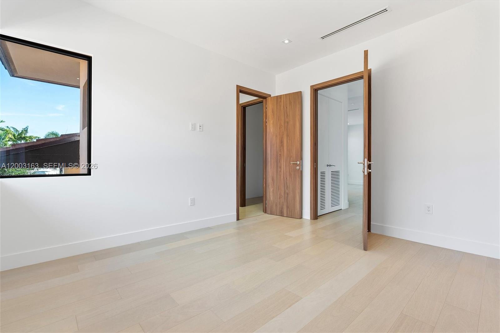 760 Woodcrest Road Key Biscayne, FL 33149 - Photo 34 of 43 #3 with walk in closet and separate bathroom