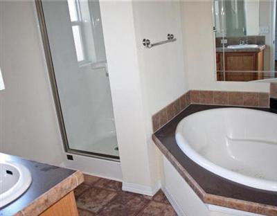58 Alpine Ranch Road Gypsum, CO 81637 - Photo 12 of 20 a bathroom with a tub and sink