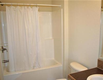 58 Alpine Ranch Road Gypsum, CO 81637 - Photo 13 of 20 a bathroom with a shower curtain