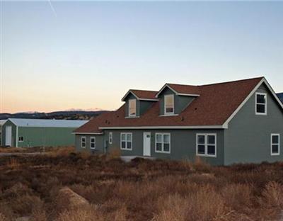 58 Alpine Ranch Road Gypsum, CO 81637 - Photo 20 of 20 a view of a house with a yard
