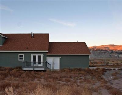 58 Alpine Ranch Road Gypsum, CO 81637 - Photo 4 of 20 a front view of a house with a yard