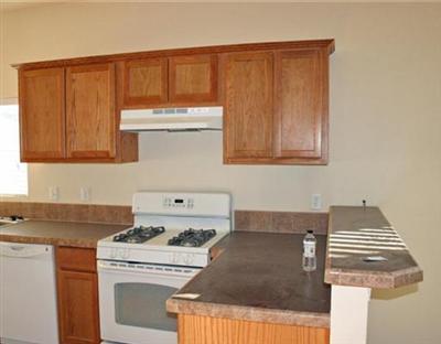 58 Alpine Ranch Road Gypsum, CO 81637 - Photo 7 of 20 a kitchen with a stove and a microwave