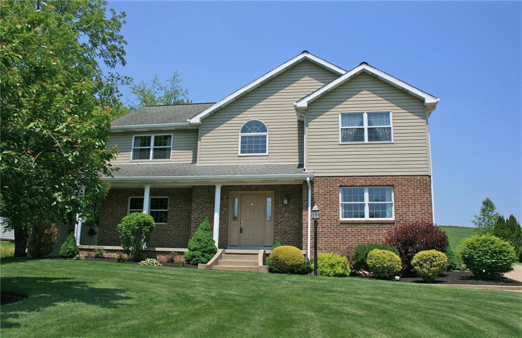 Pretty as a postcard!  Enjoy the front porch and farm views!