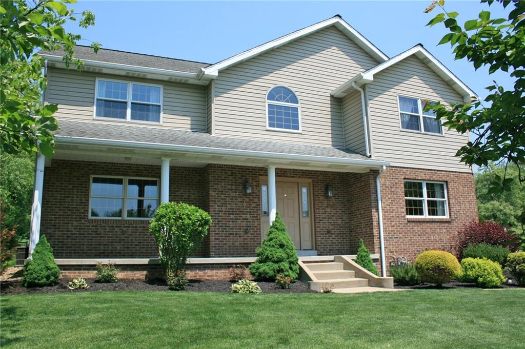 A welcoming front porch to greet your guests!  Enjoy the view of the neighboring farm!