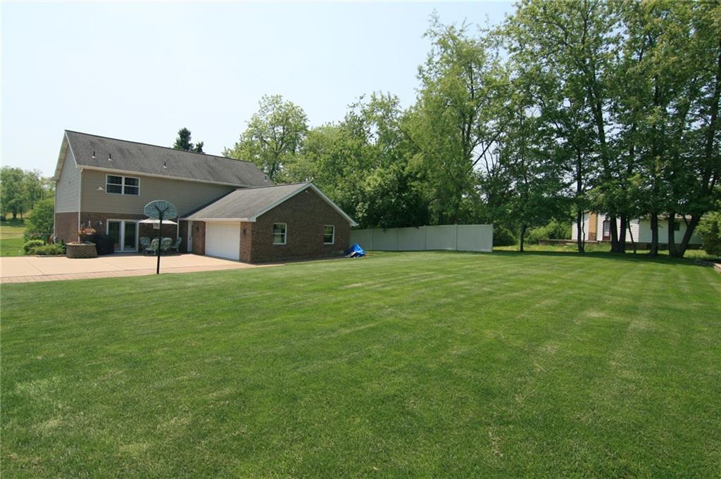 1580 Nine Eighty Road Canonsburg, PA 15317 - Photo 15 of 25 Spacious yard with room to breathe! Large, level rear yard with privacy! Large driveway turn-around and extra parking pad. (The garage has pull-down access to storage!)