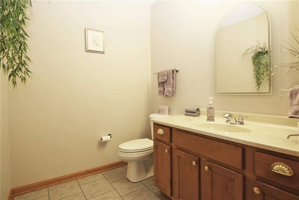 1580 Nine Eighty Road Canonsburg, PA 15317 - Photo 16 of 25 First floor powder room for convenience...offers tile flooring and a maple vanity.