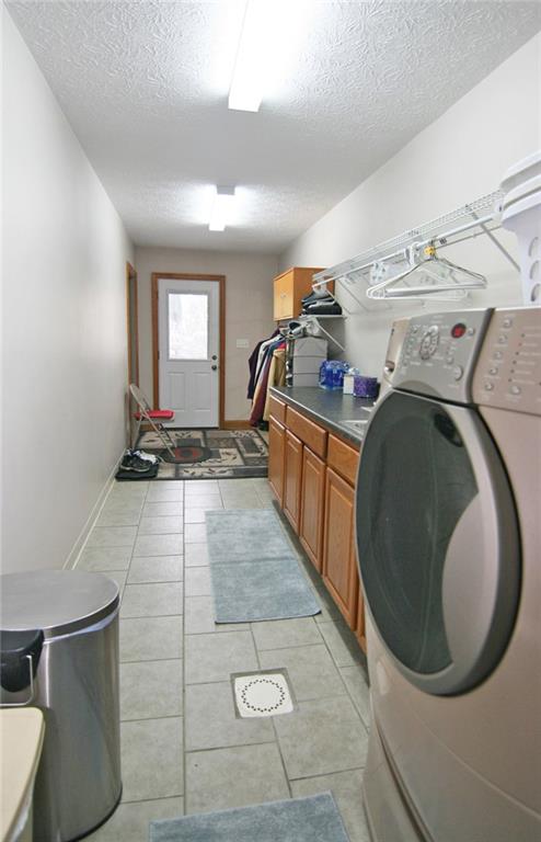 1580 Nine Eighty Road Canonsburg, PA 15317 - Photo 17 of 25 With garage and yard access, the first floor laundry room pulls double services as a mud room.