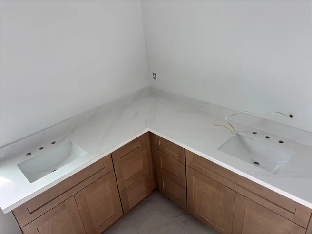 a utility room with a sink