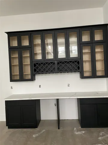 a view of wooden floor and a cabinet