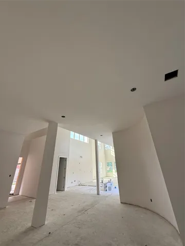 a view of a livingroom with wooden floor