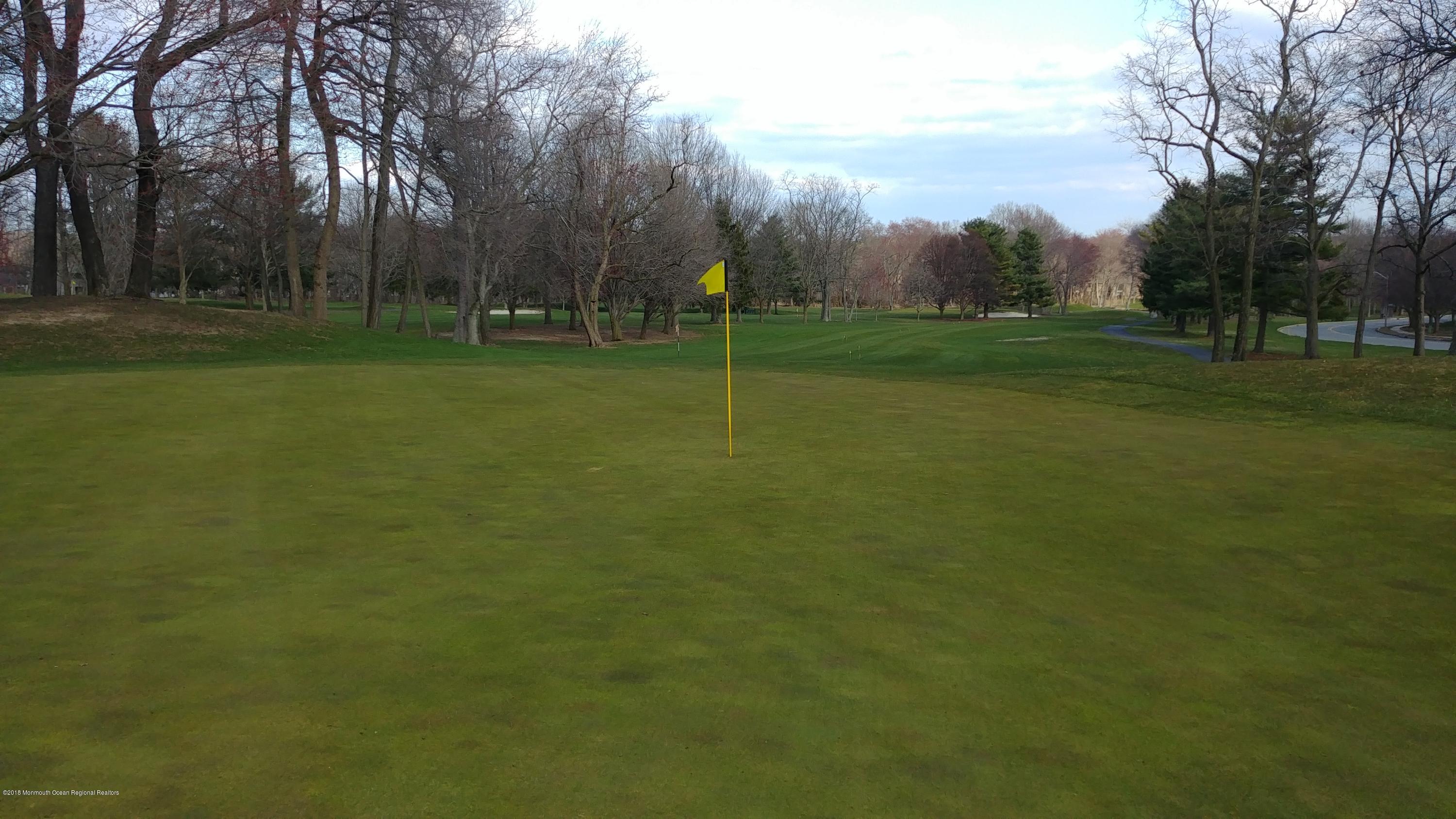 177 Amberly Drive, Unit K Manalapan, NJ 07726 - Photo 13 of 19 a view of a park