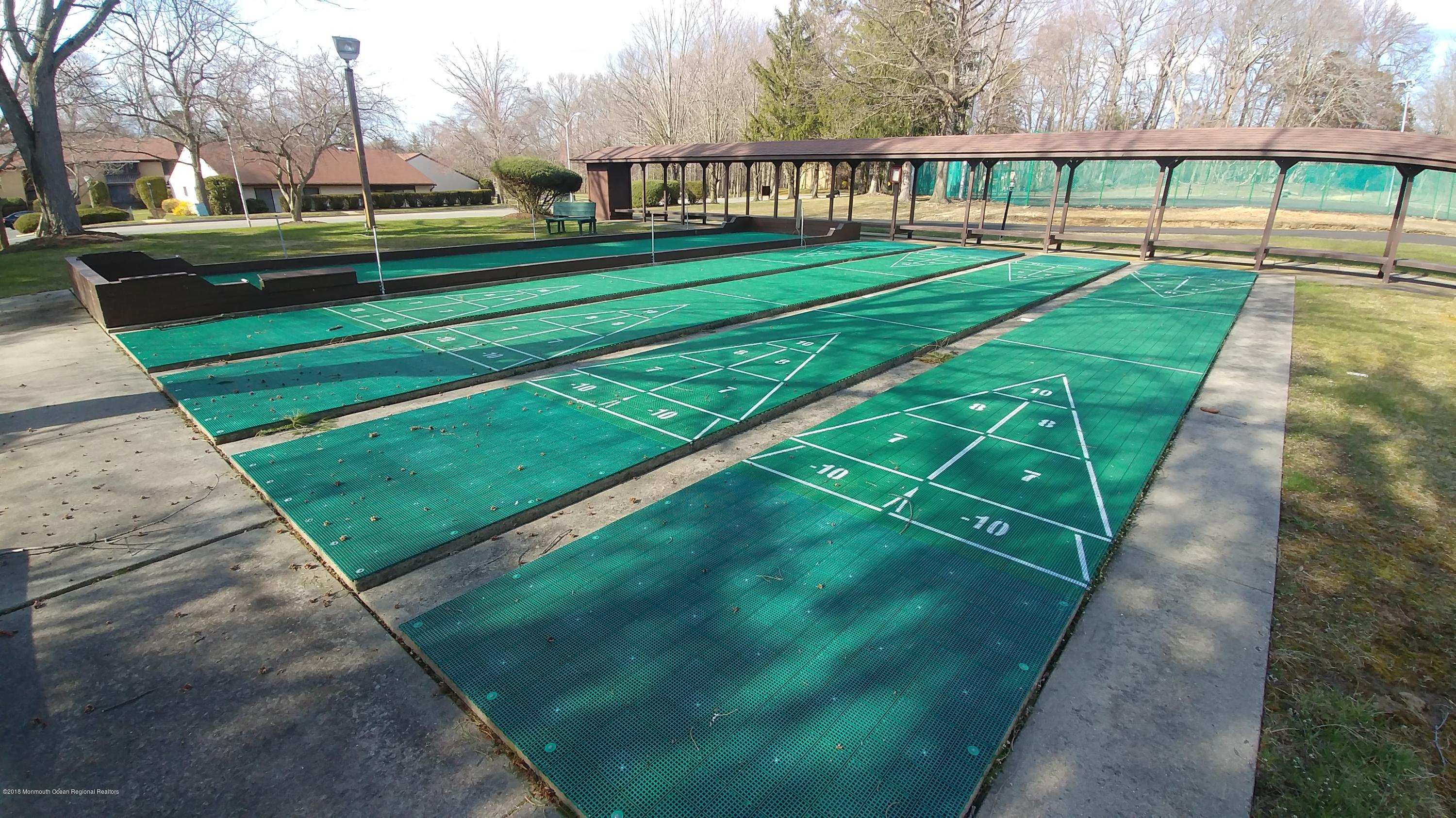 177 Amberly Drive, Unit K Manalapan, NJ 07726 - Photo 16 of 19 a view of green field