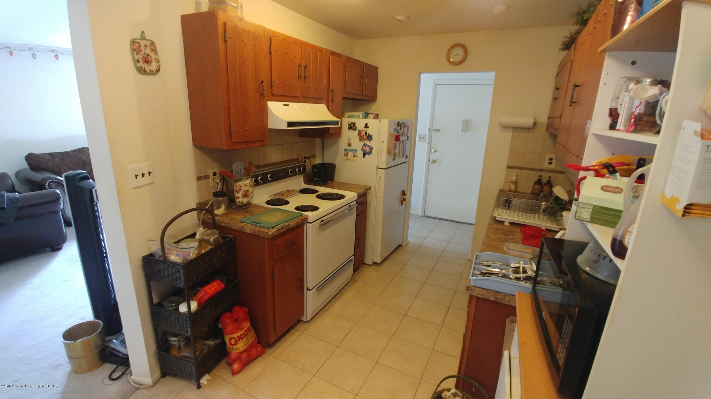 177 Amberly Drive, Unit K Manalapan, NJ 07726 - Photo 3 of 19 a view of a storage & utility room