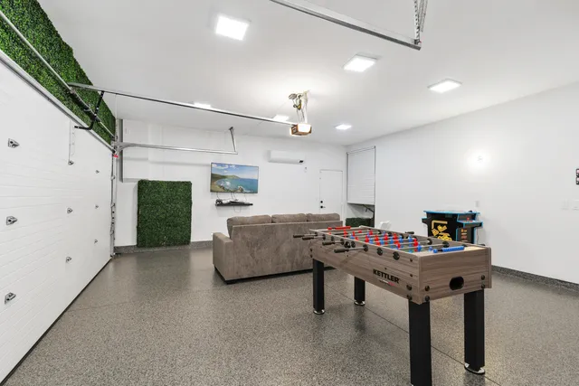 a kitchen with a table and chairs in it