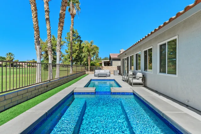 a house view with a garden space