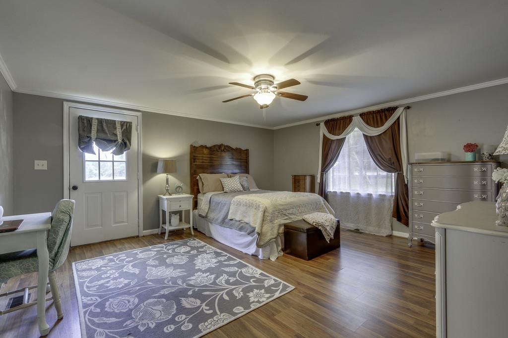 301 Whitson Road Bethpage, TN 37022 - Photo 17 of 29 a bed room with a bed and furniture