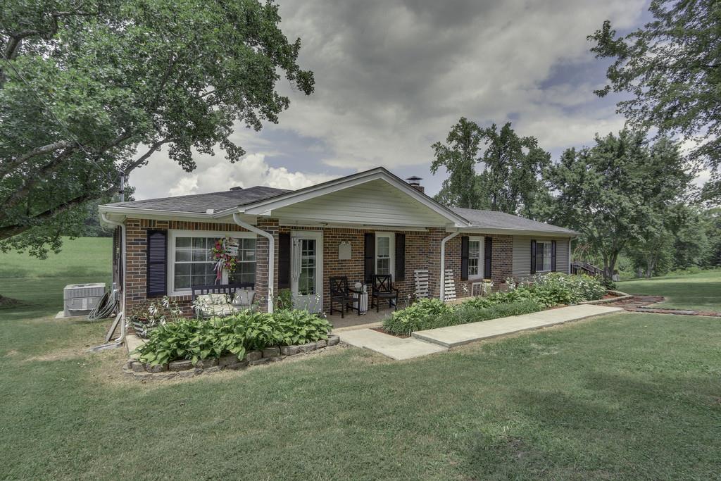 301 Whitson Road Bethpage, TN 37022 - Photo 2 of 29 front view of a house with a yard