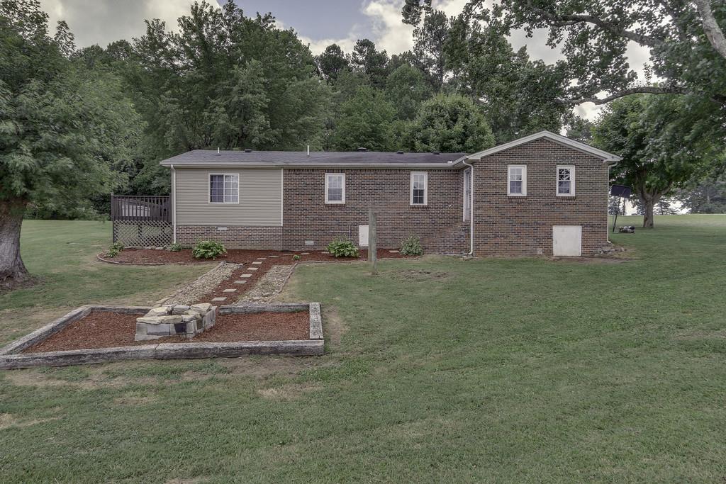 301 Whitson Road Bethpage, TN 37022 - Photo 26 of 29 a front view of a house with a yard