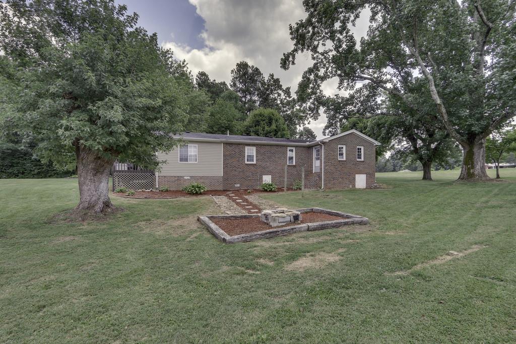 301 Whitson Road Bethpage, TN 37022 - Photo 27 of 29 a front view of a house with a yard