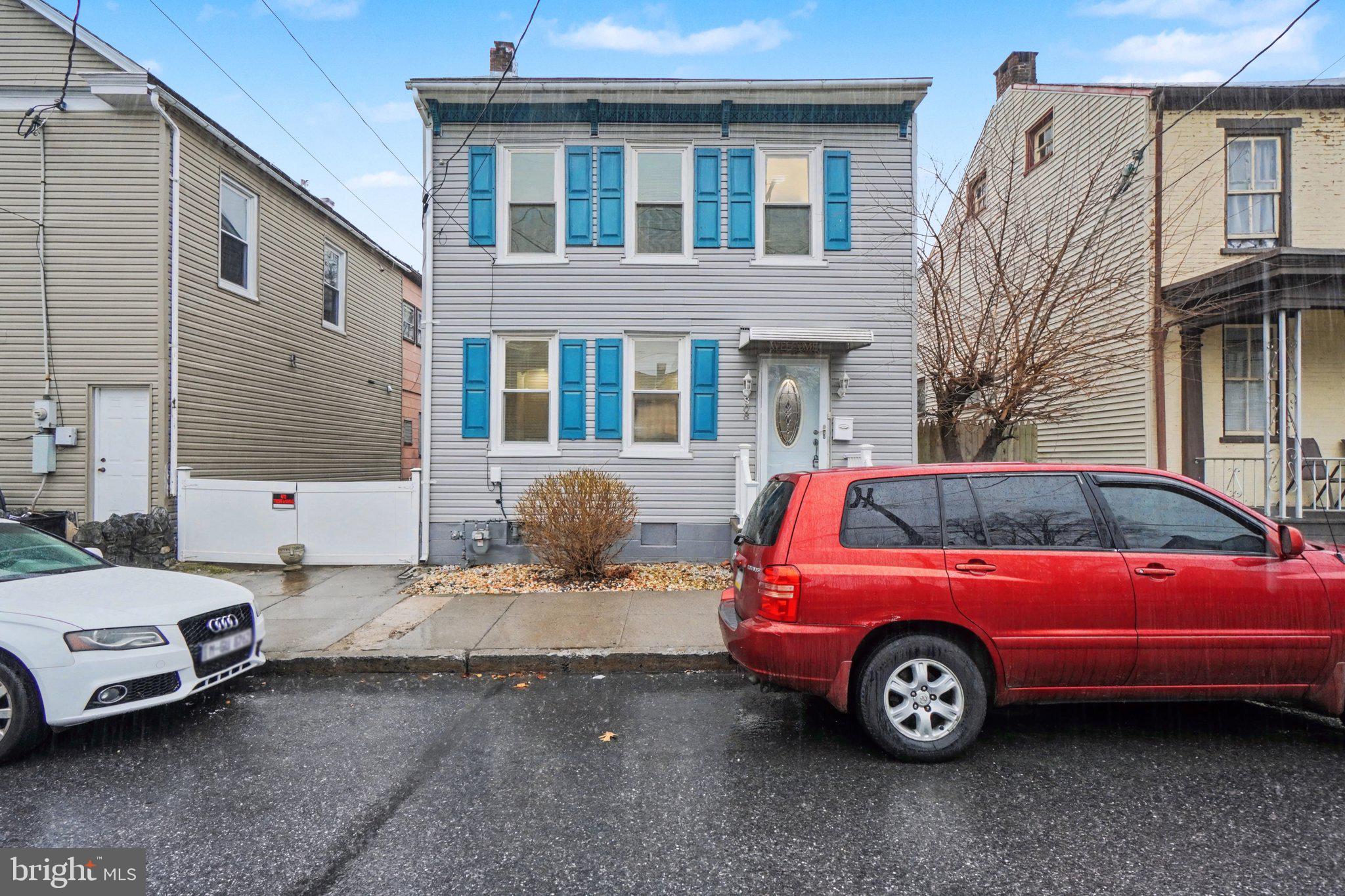 808 Locust Street Lebanon, PA 17042 - Photo 2 of 33 a front view of a house with parking space