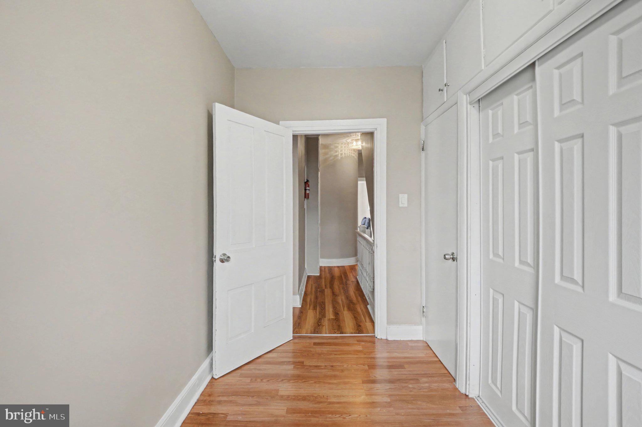 808 Locust Street Lebanon, PA 17042 - Photo 23 of 33 a view of a hallway with wooden floor and staircase