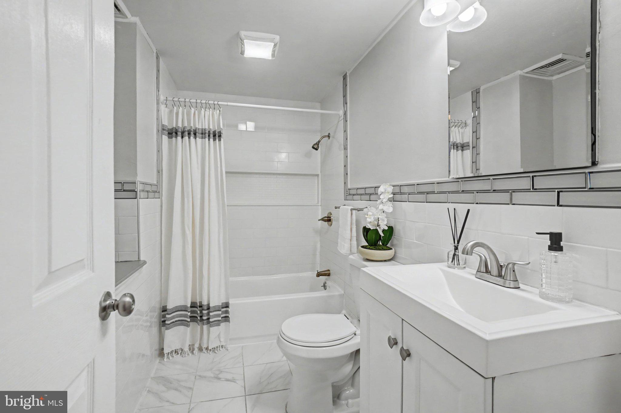 808 Locust Street Lebanon, PA 17042 - Photo 25 of 33 a bathroom with a sink toilet and shower