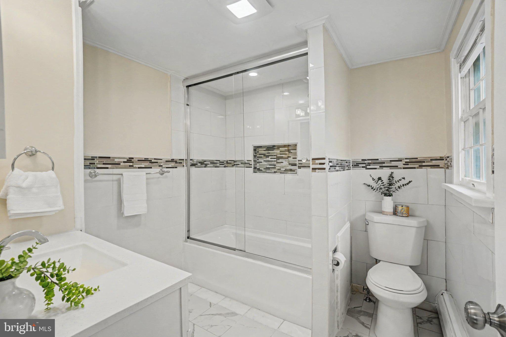 808 Locust Street Lebanon, PA 17042 - Photo 29 of 33 a bathroom with a sink a toilet and shower