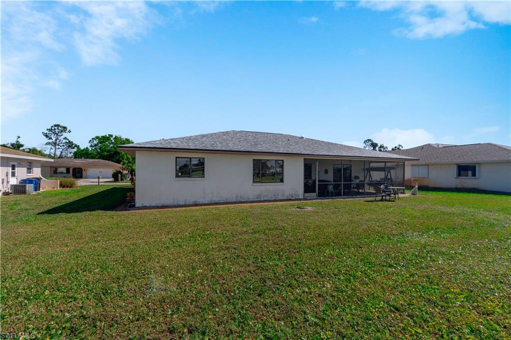 17600 Laurel Valley Road Fort Myers, FL 33967 - Photo 25 of 26 a front view of a house with garden