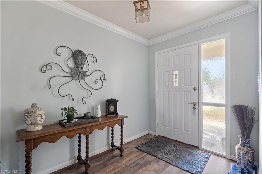 17600 Laurel Valley Road Fort Myers, FL 33967 - Photo 4 of 26 a view of an entryway with wooden floor