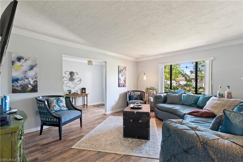 17600 Laurel Valley Road Fort Myers, FL 33967 - Photo 5 of 26 a living room with furniture a rug and a window