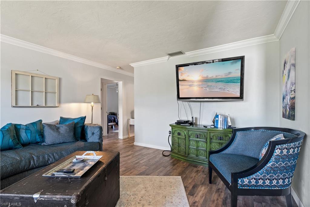17600 Laurel Valley Road Fort Myers, FL 33967 - Photo 7 of 26 a living room with furniture and a couch