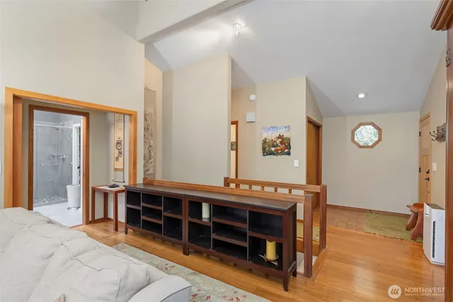 a bedroom with furniture and a window