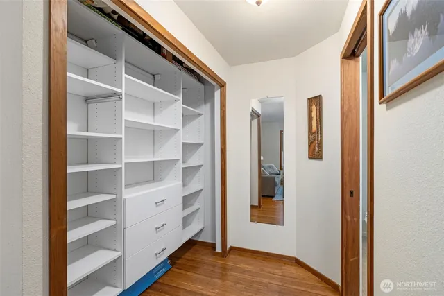 a view of closet area with empty racks