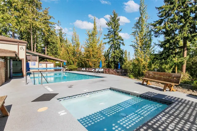 a view of a patio with a table and chairs