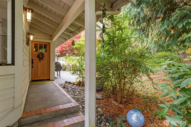 a view of a porch with wooden floor