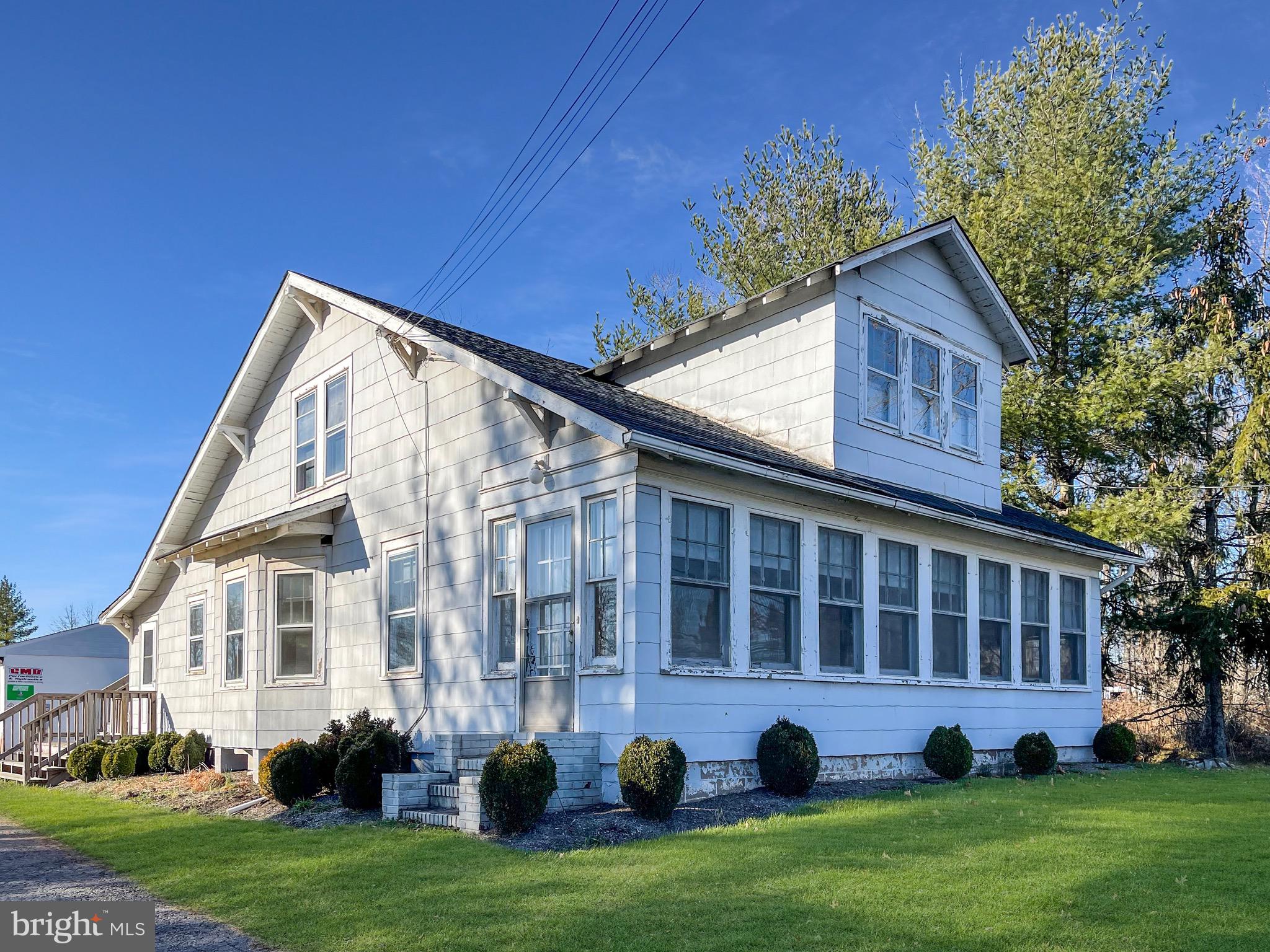 62 Highway 31, Unit 1 Pennington, NJ 08534 - Photo 1 of 1 a view of house with yard