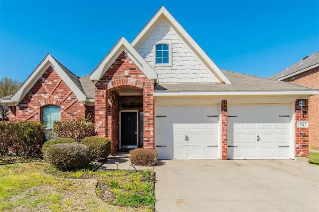 a view of house and yard with green space
