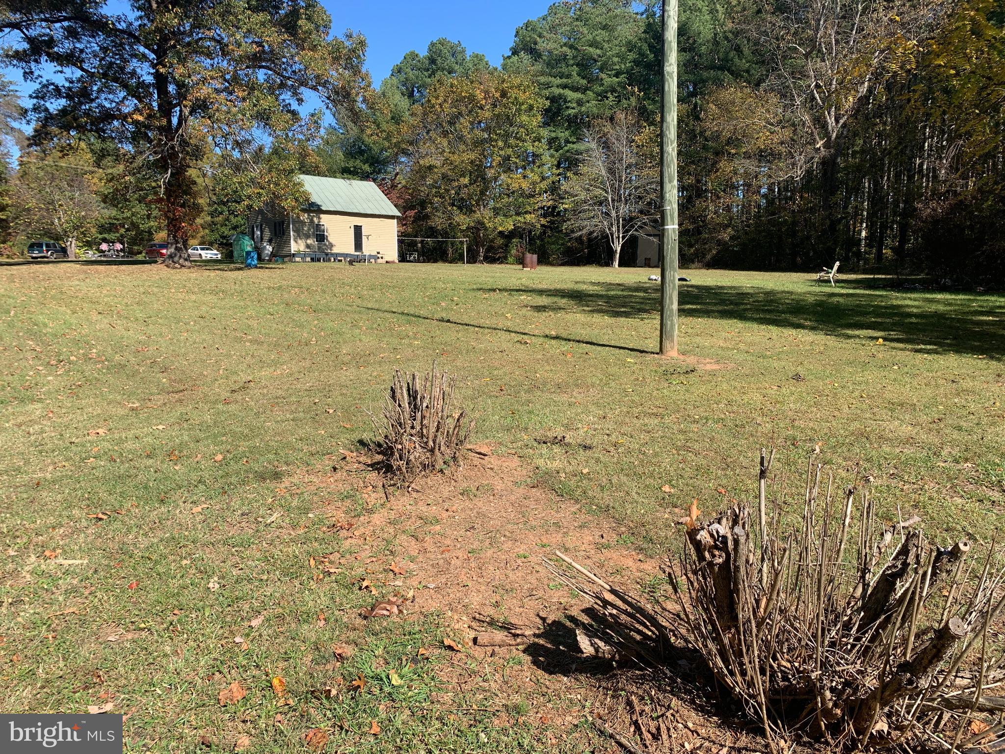 28282 Raccoon Ford Road Culpeper, VA 22701 - Photo 14 of 34 a view of outdoor space with deck and yard