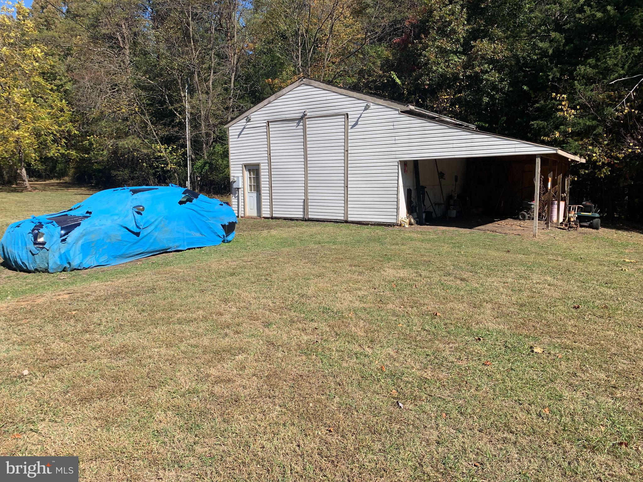 28282 Raccoon Ford Road Culpeper, VA 22701 - Photo 20 of 34 a view of a backyard of the house