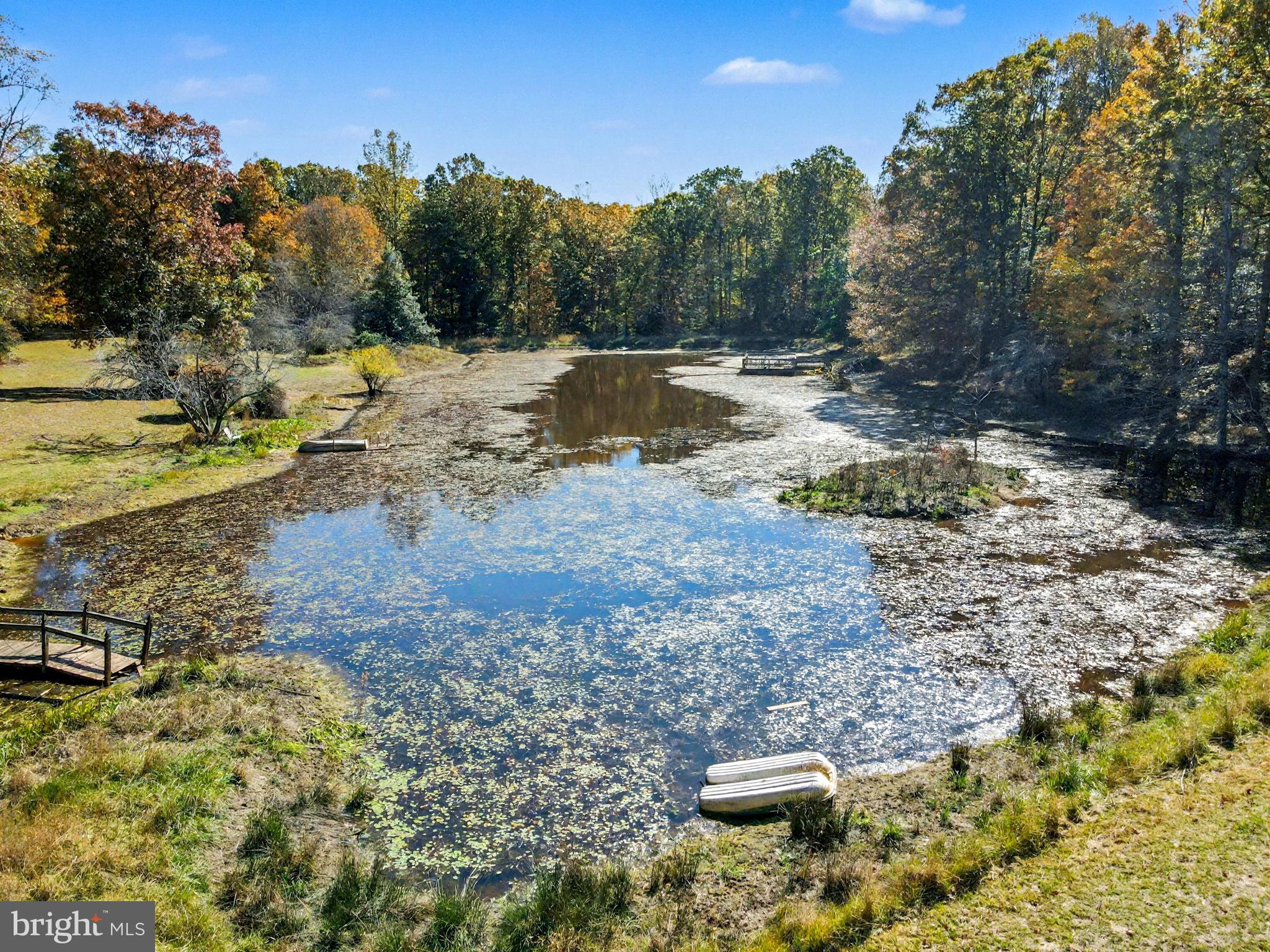 28282 Raccoon Ford Road Culpeper, VA 22701 - Photo 2 of 34 a view of a yard with wooden fence