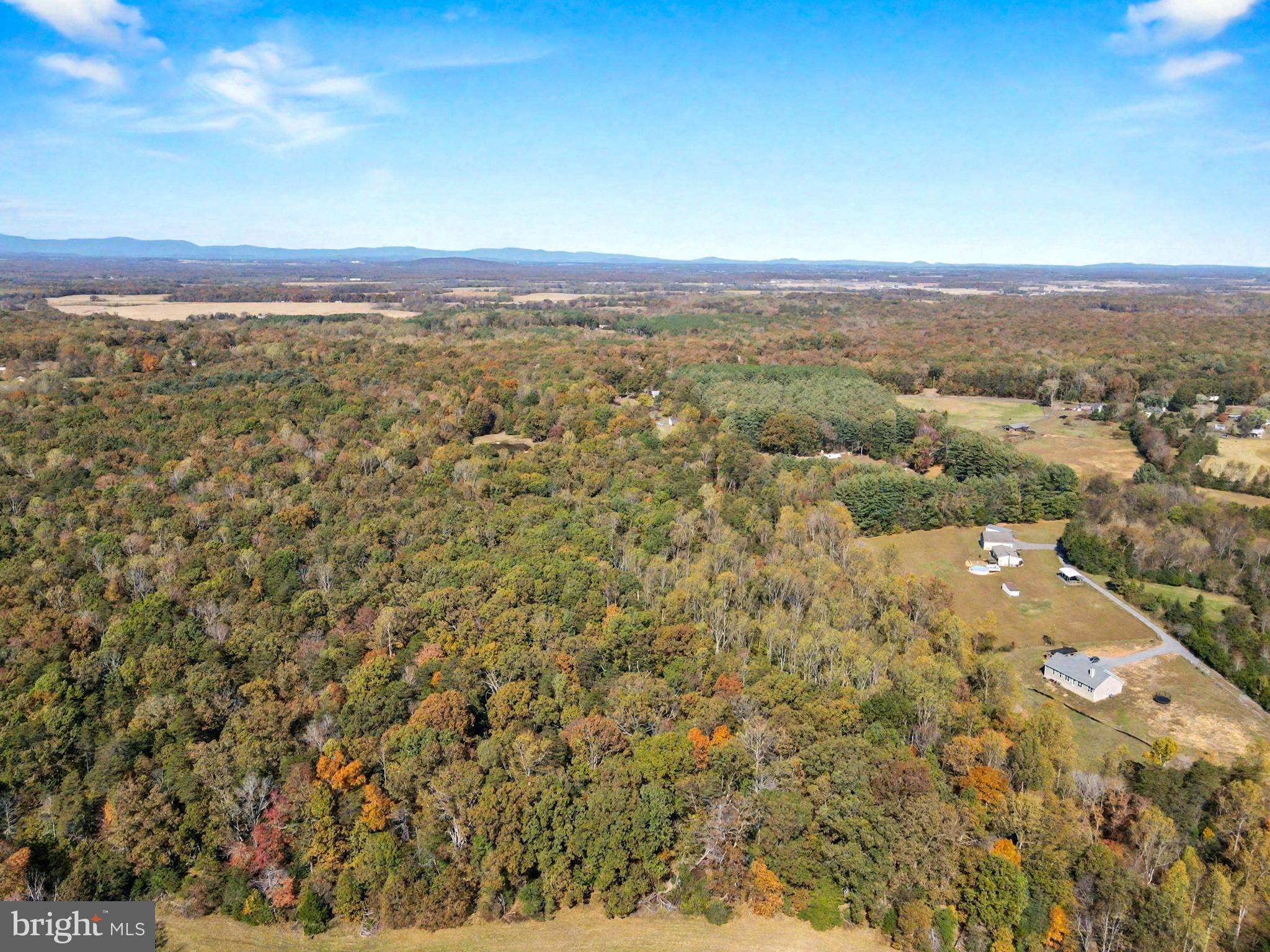 28282 Raccoon Ford Road Culpeper, VA 22701 - Photo 8 of 34 an aerial view of residential houses with outdoor space