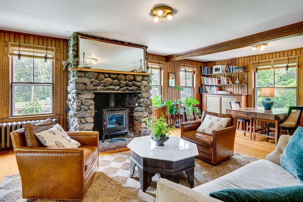208 Ridge Street Winchester, MA 01890 - Photo 11 of 42 a living room with furniture and a fireplace